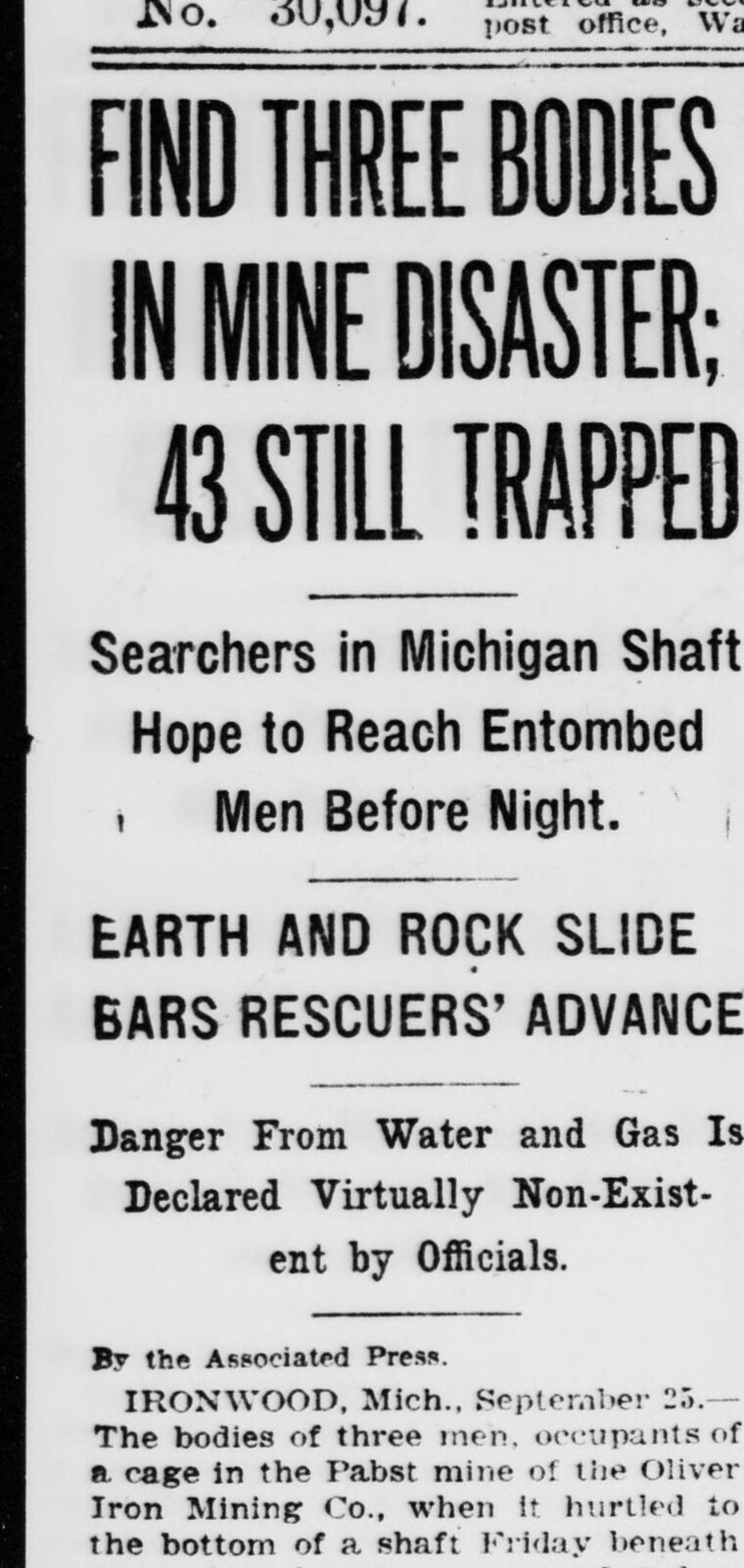 Newspaper headline stack: “Find Three Bodies in Mine Disaster; 43 Still Trapped — Searchers in Michigan Shaft Hope to Reach Entombed Men Before Night — Earth and Rock Slide Bars Rescuers’ Advance.”